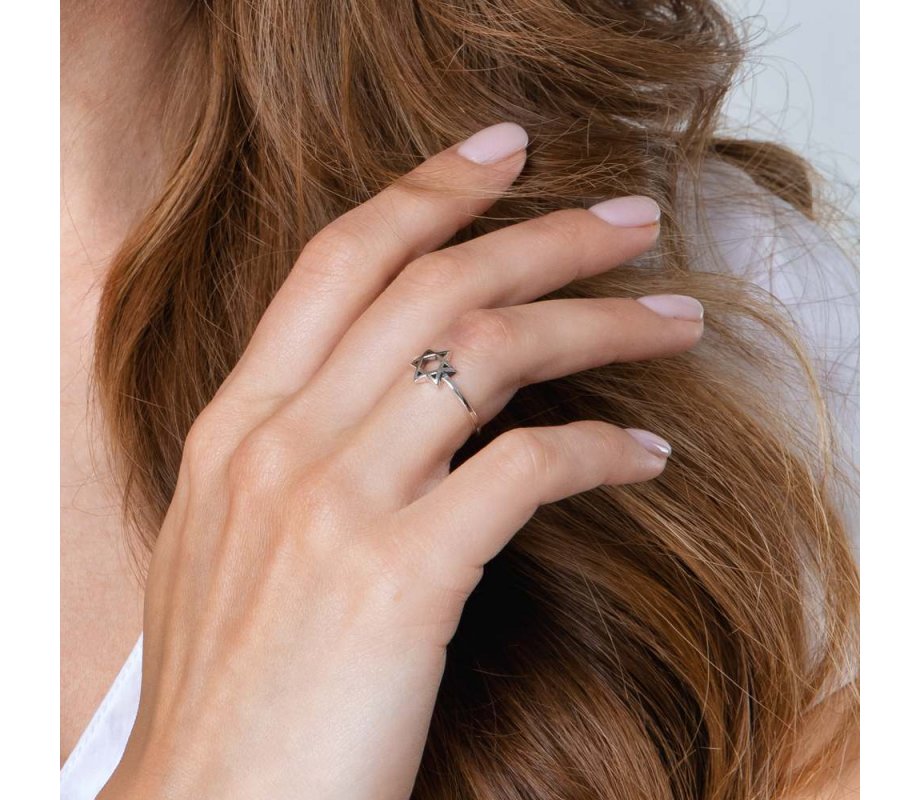 Ring of Sterling Silver with a Raised Cutout Star of David